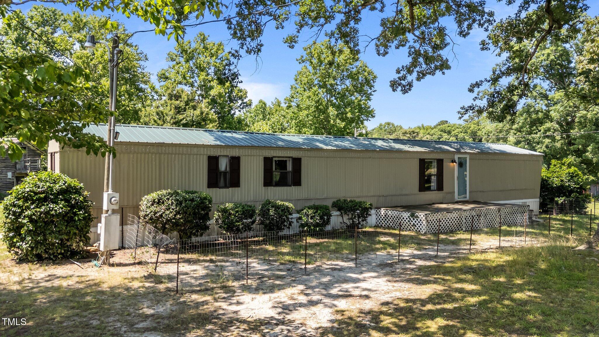 1355 Sykes Road Spring Hope, NC 27882 - Photo 4 of 39 3-web-or-mls-DJI_20250603143825_0749_D
