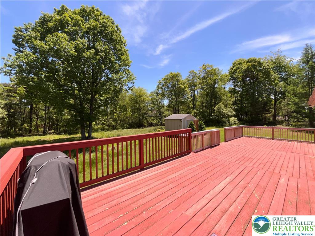 1646 Clover Road Long Pond, PA 18334 - Photo 16 of 20 a view of balcony with wooden floor and fence