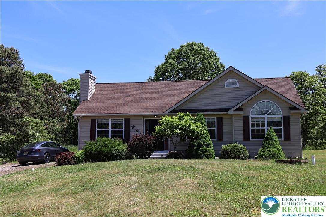 1646 Clover Road Long Pond, PA 18334 - Photo 2 of 20 a house view with a garden space