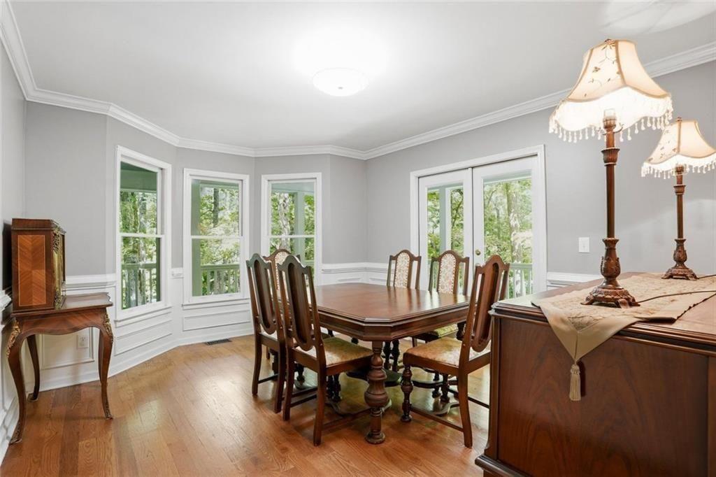 3259 Etchison Road Loganville, GA 30052 - Photo 6 of 50 a view of a dining room with furniture window and outside view