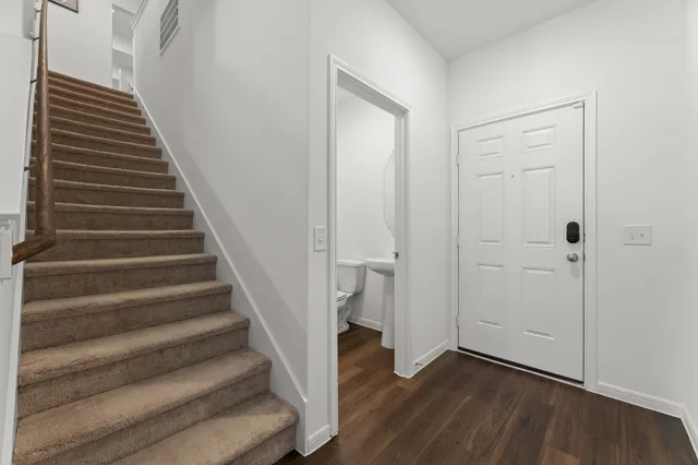 a view of an entryway with stairs