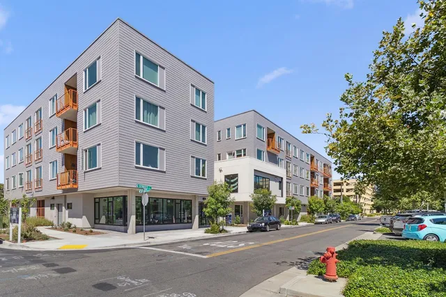 a front view of a building with street view