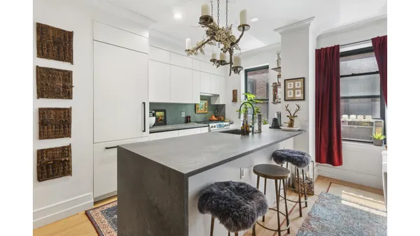 a view of kitchen and living room