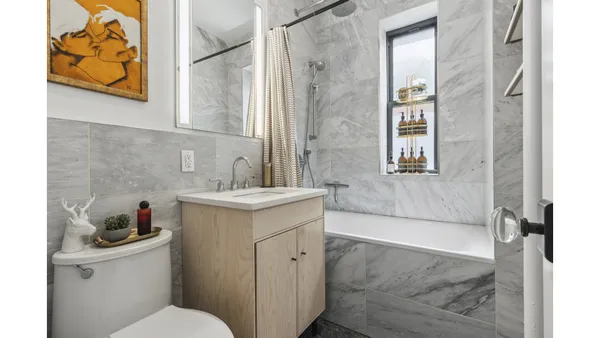 a bathroom with a sink and a toilet