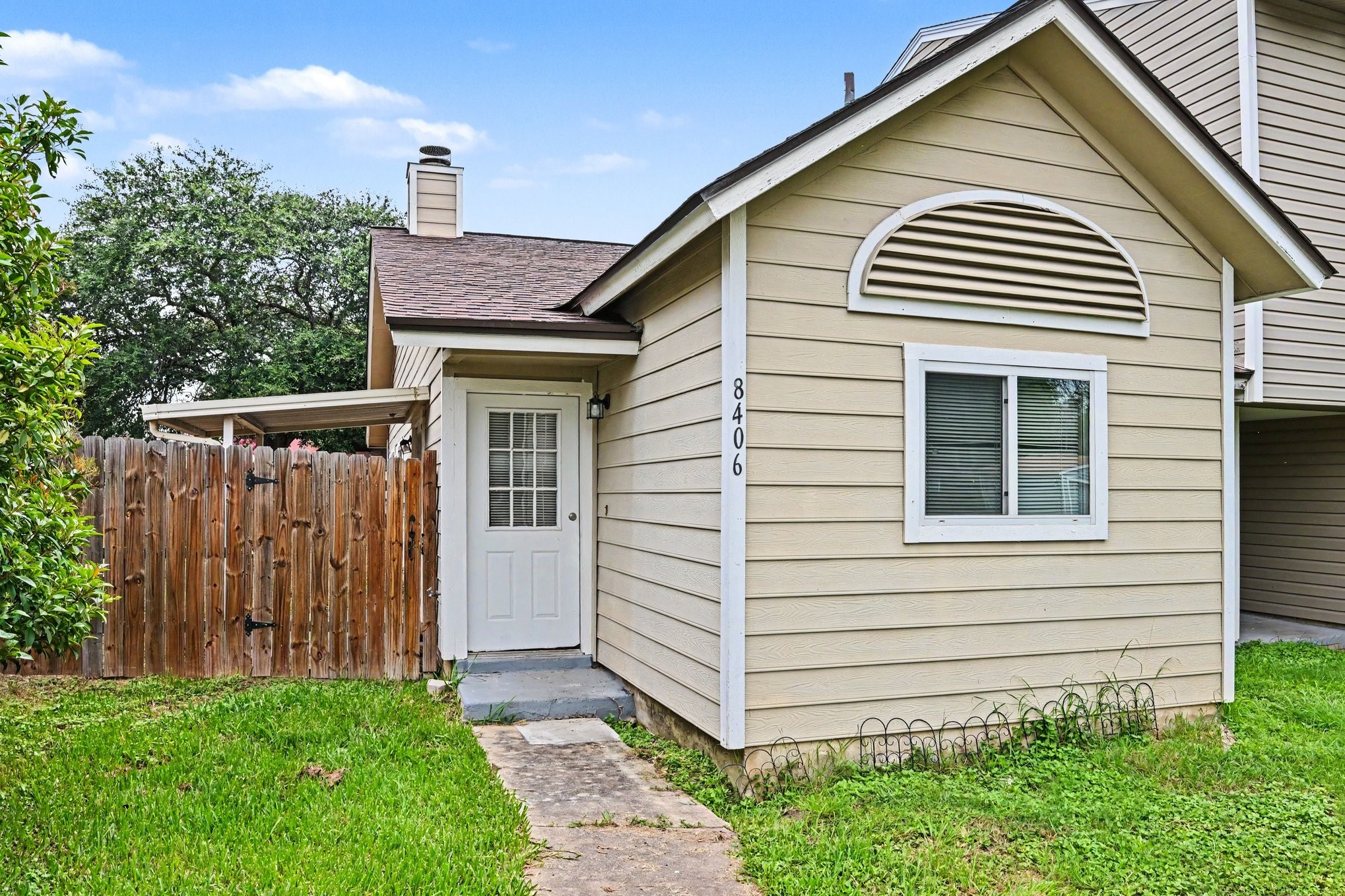 8406 Forest Ridge Drive San Antonio, TX 78239 - Photo 3 of 33 a front view of a house with a garden