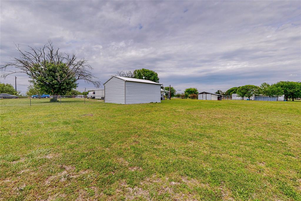 1501 Joyce Road Kaufman, TX 75142 - Photo 31 of 37 a view of a lake with a big yard