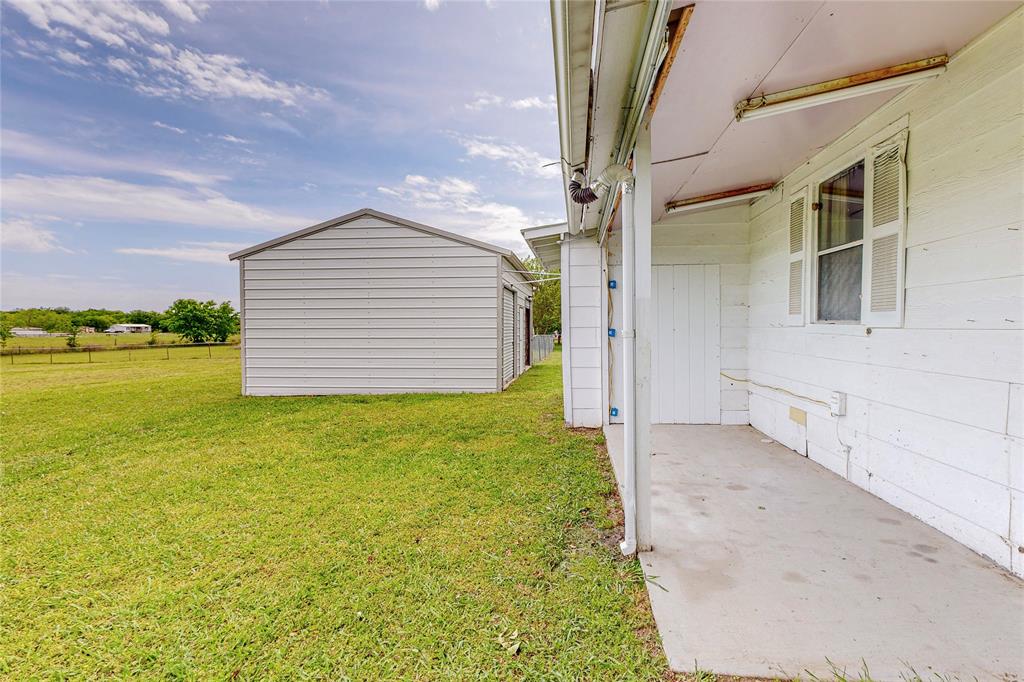 1501 Joyce Road Kaufman, TX 75142 - Photo 4 of 37 a view of a backyard of the house