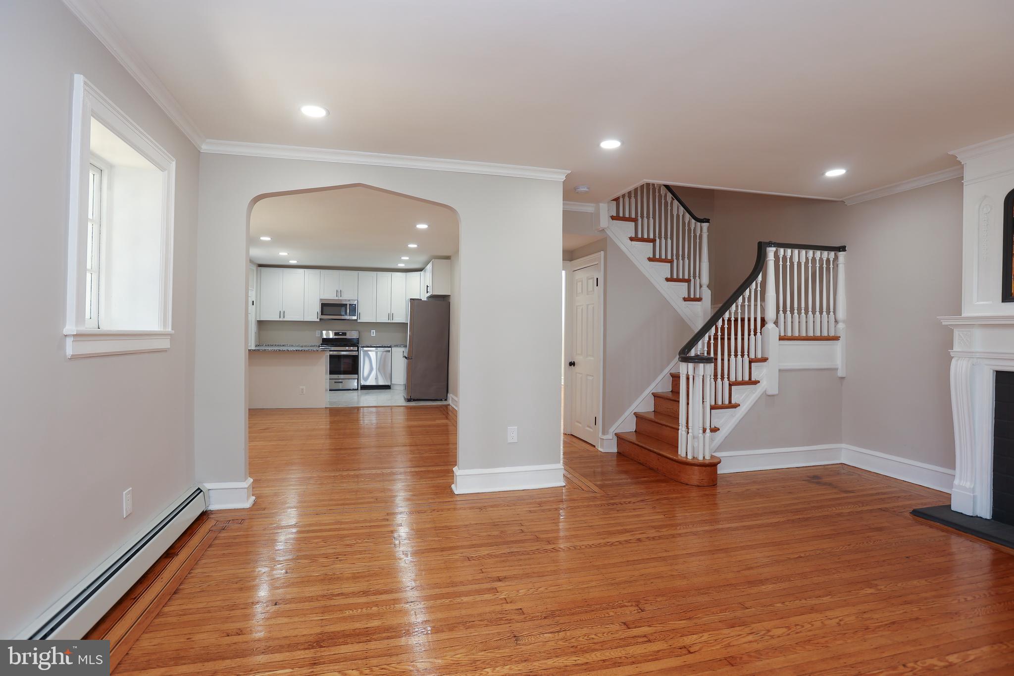 12 East Providence Road Lansdowne, PA 19050 - Photo 1 of 30 a view of entryway and hall with wooden floor