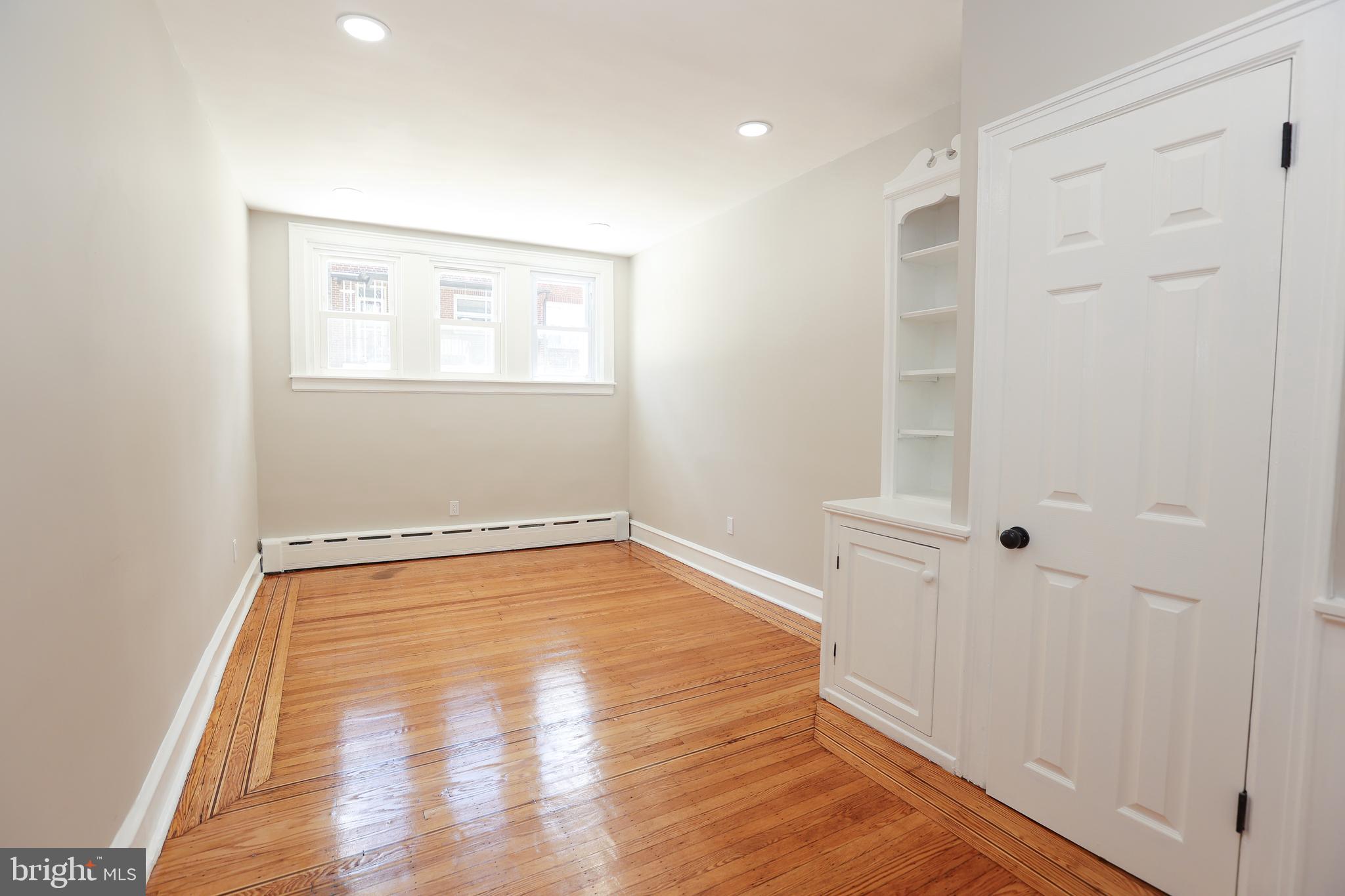 12 East Providence Road Lansdowne, PA 19050 - Photo 11 of 30 a view of a room with wooden floor and cabinet