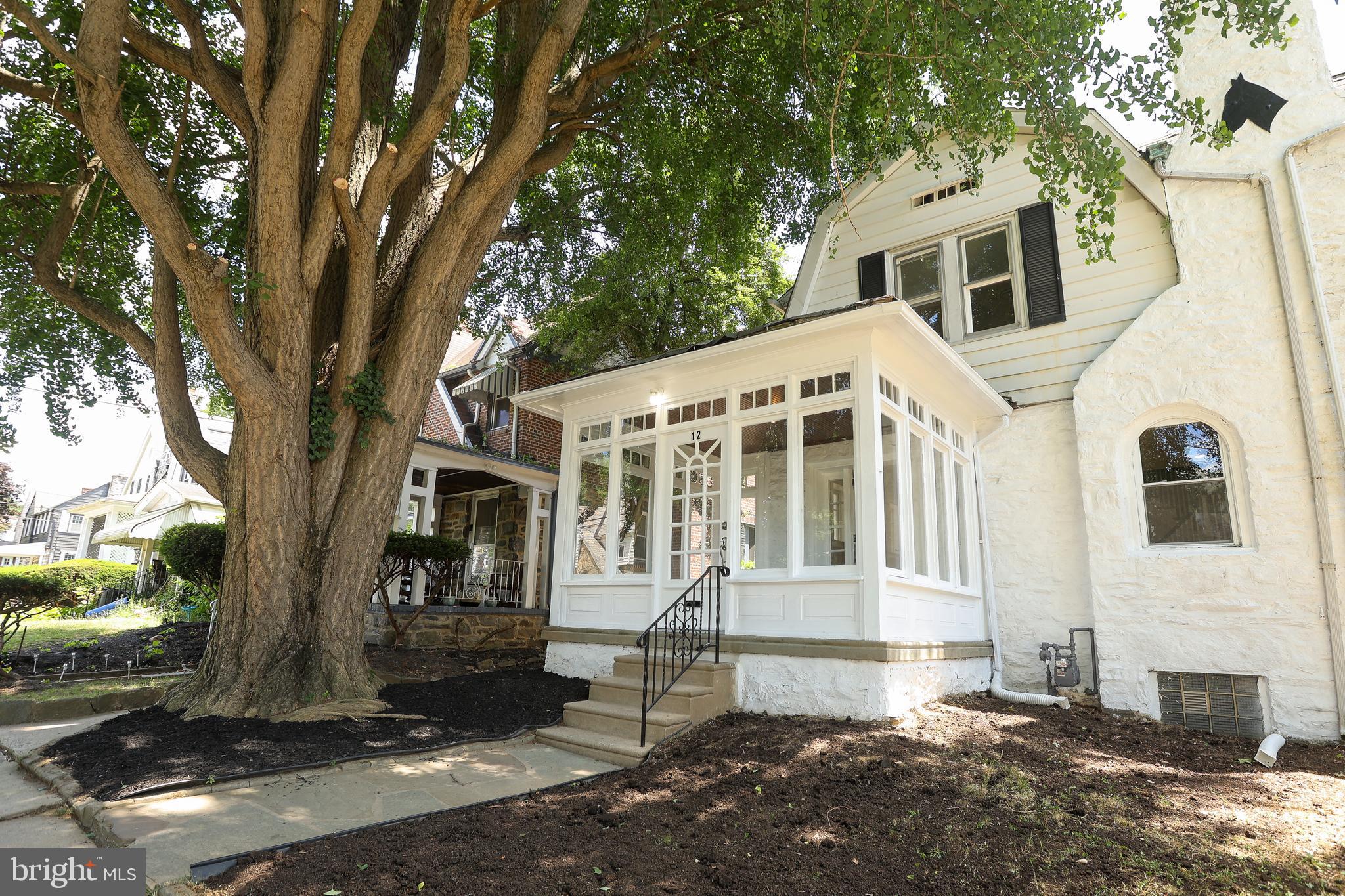 12 East Providence Road Lansdowne, PA 19050 - Photo 2 of 30 a front view of a house with a yard