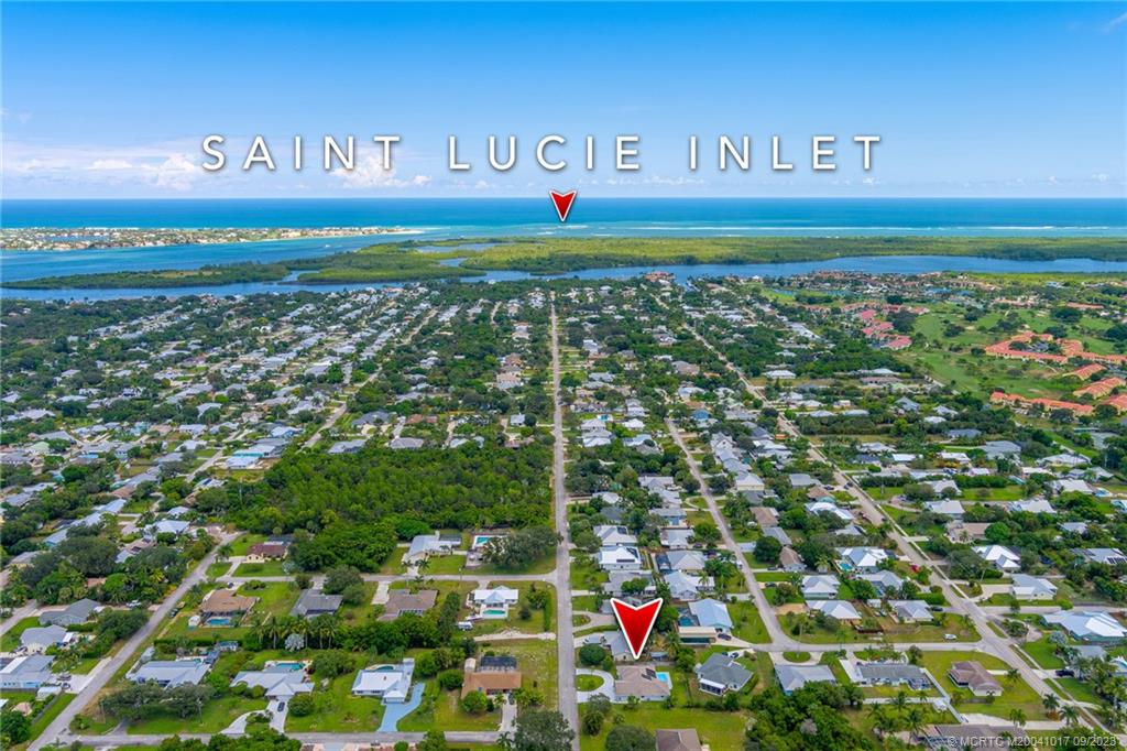 5008 Southeast Major Way Stuart, FL 34997 - Photo 1 of 20 a sign that is sitting on a brick wall