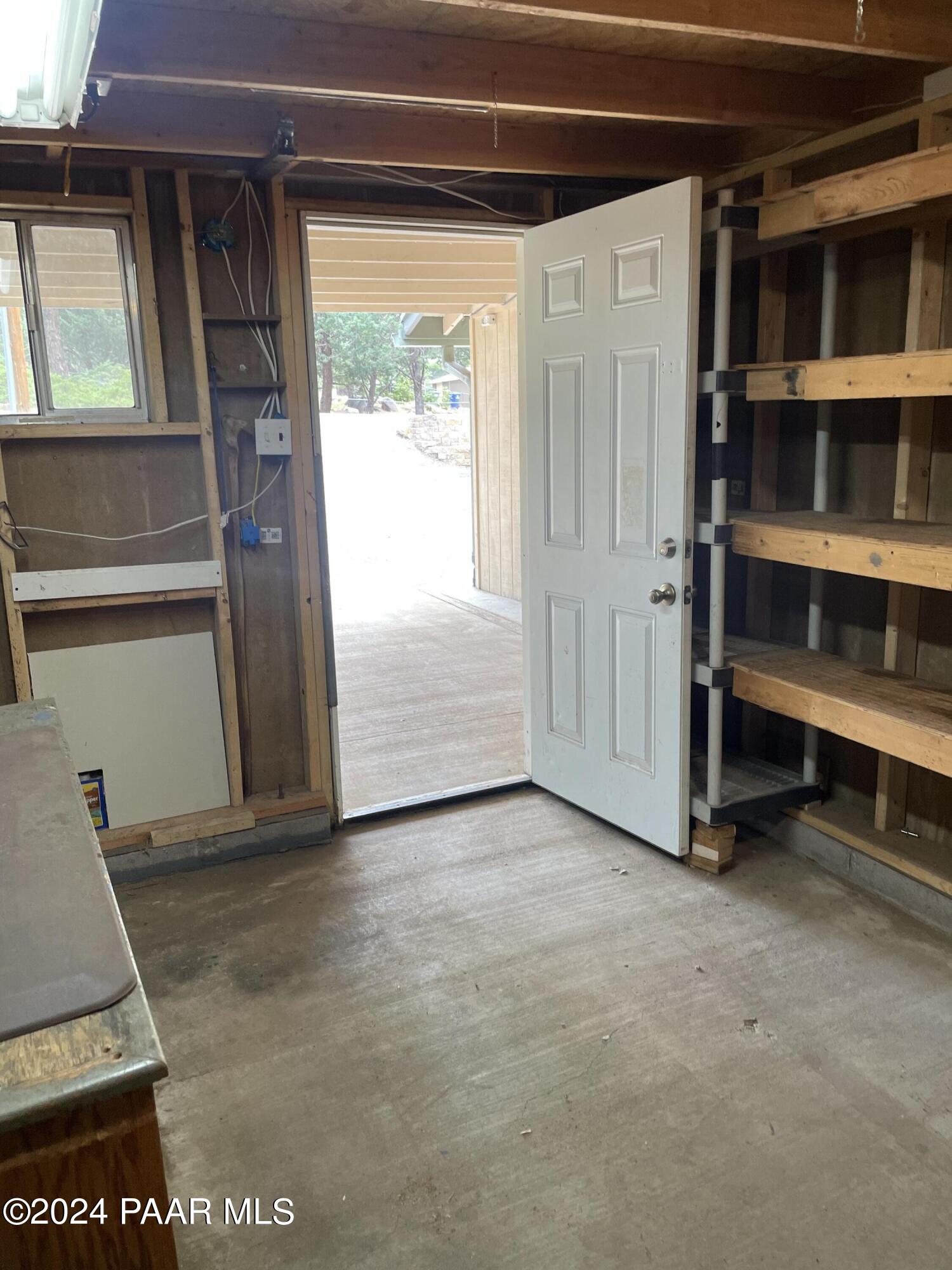 1803 Thumb Butte Road Prescott, AZ 86305 - Photo 37 of 42 Shop with tons of shelving