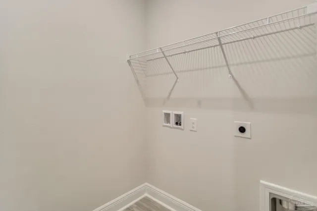 a view of a room with racks on the wall