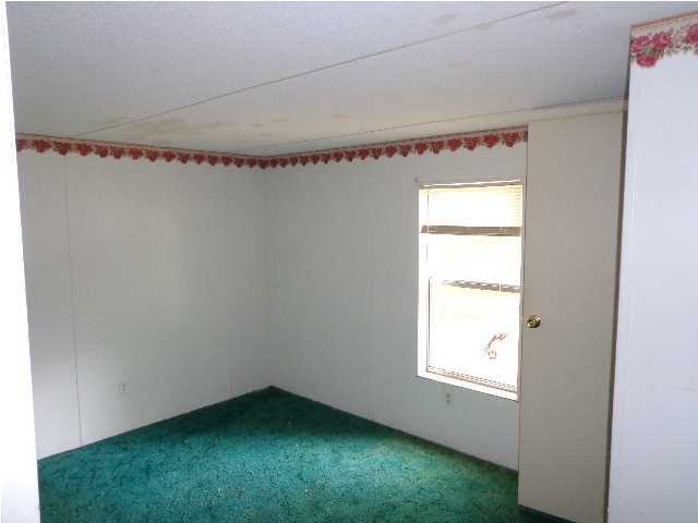 6120 Old River Road Baker, FL 32531 - Photo 3 of 7 a view of an empty room with window