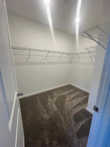 a view of a room with racks on the wall