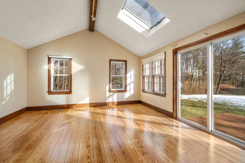 9 R Conant Street Acton, MA 01720 - Photo 18 of 42 a view of an empty room with glass door and balcony