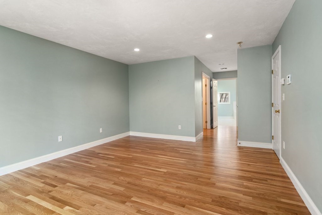 9 R Conant Street Acton, MA 01720 - Photo 24 of 42 a view of an empty room and wooden floor