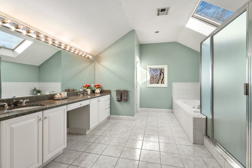 9 R Conant Street Acton, MA 01720 - Photo 25 of 42 a large white kitchen with a stove a sink dishwasher and a refrigerator