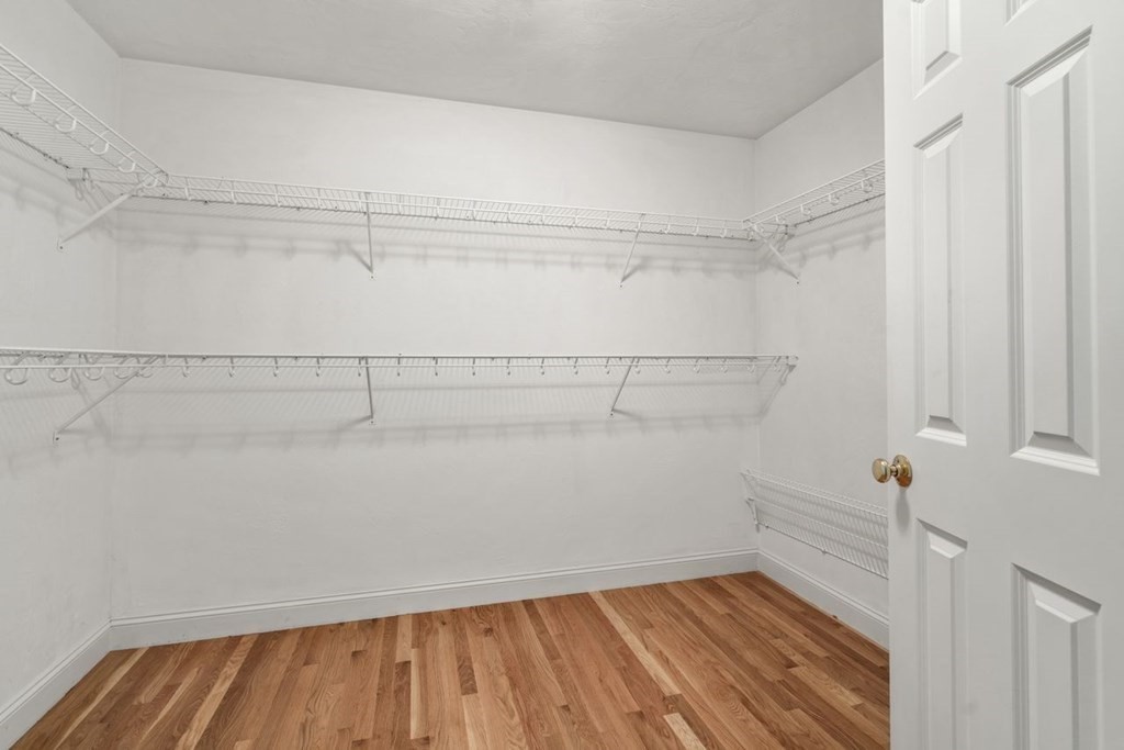9 R Conant Street Acton, MA 01720 - Photo 26 of 42 a view of a room with racks on the wall