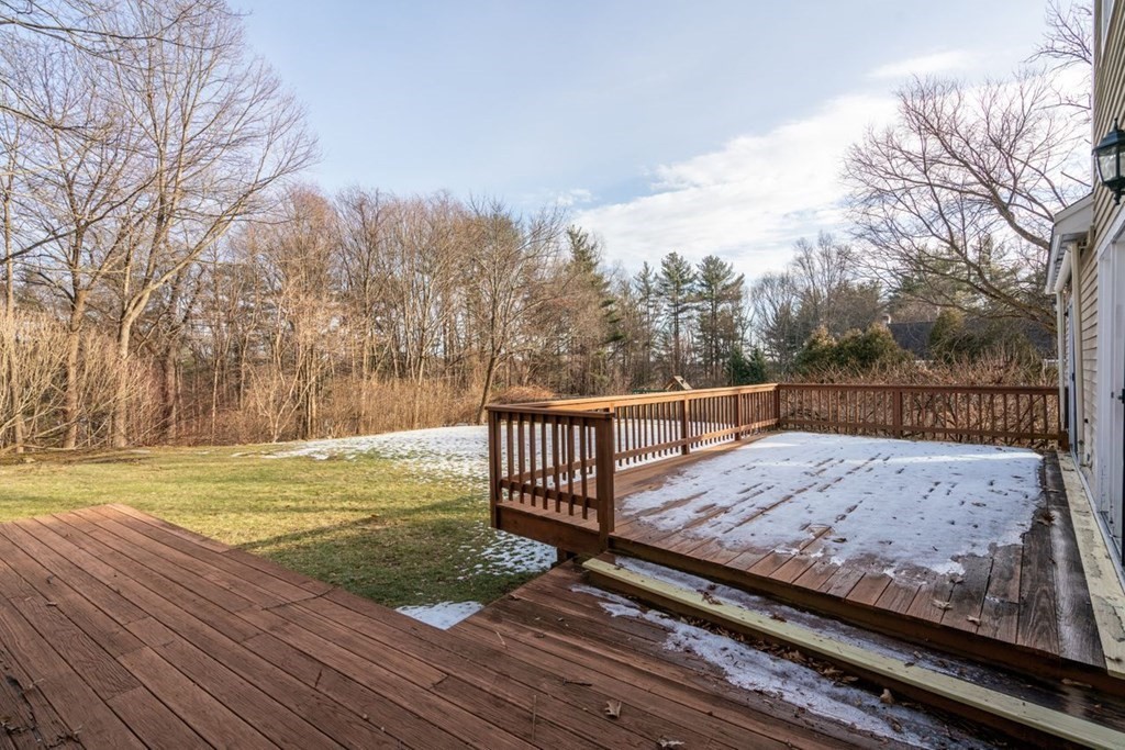 9 R Conant Street Acton, MA 01720 - Photo 33 of 42 a view of a wooden deck with trees