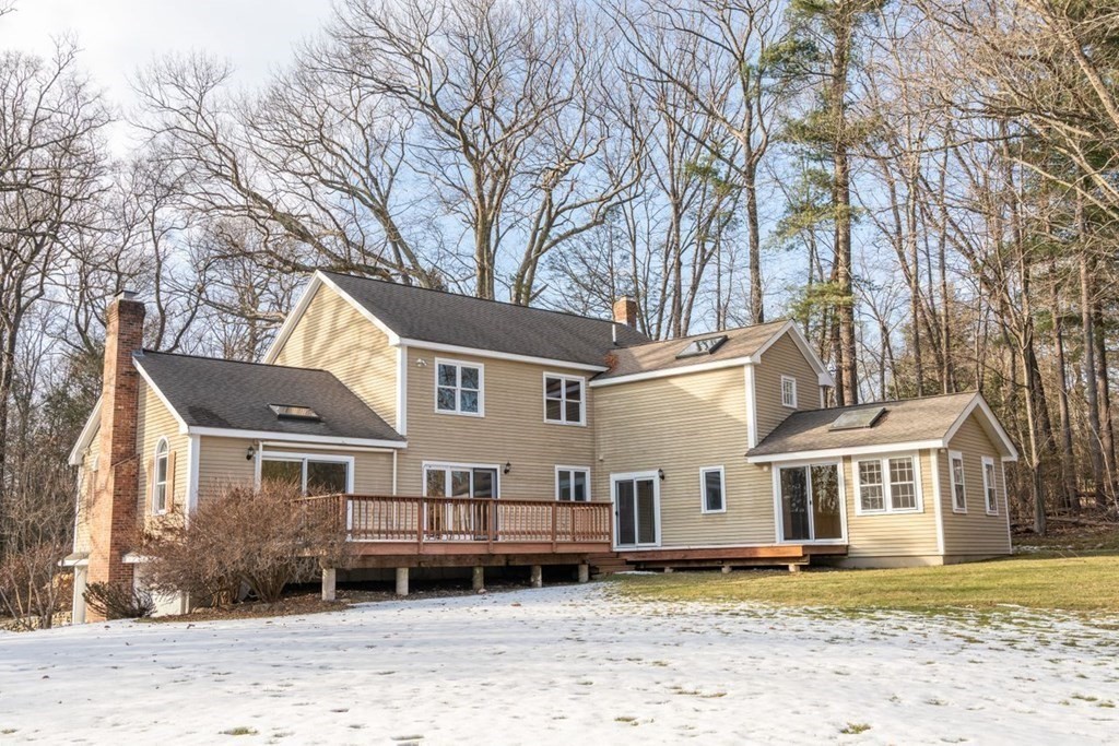 9 R Conant Street Acton, MA 01720 - Photo 41 of 42 a front view of a house with a yard