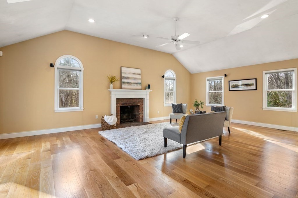 9 R Conant Street Acton, MA 01720 - Photo 6 of 42 a living room with furniture and a fireplace