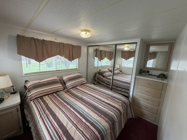 2795 East 28th Road Marseilles, IL 61341 - Photo 16 of 91 a bedroom with two beds and a large window