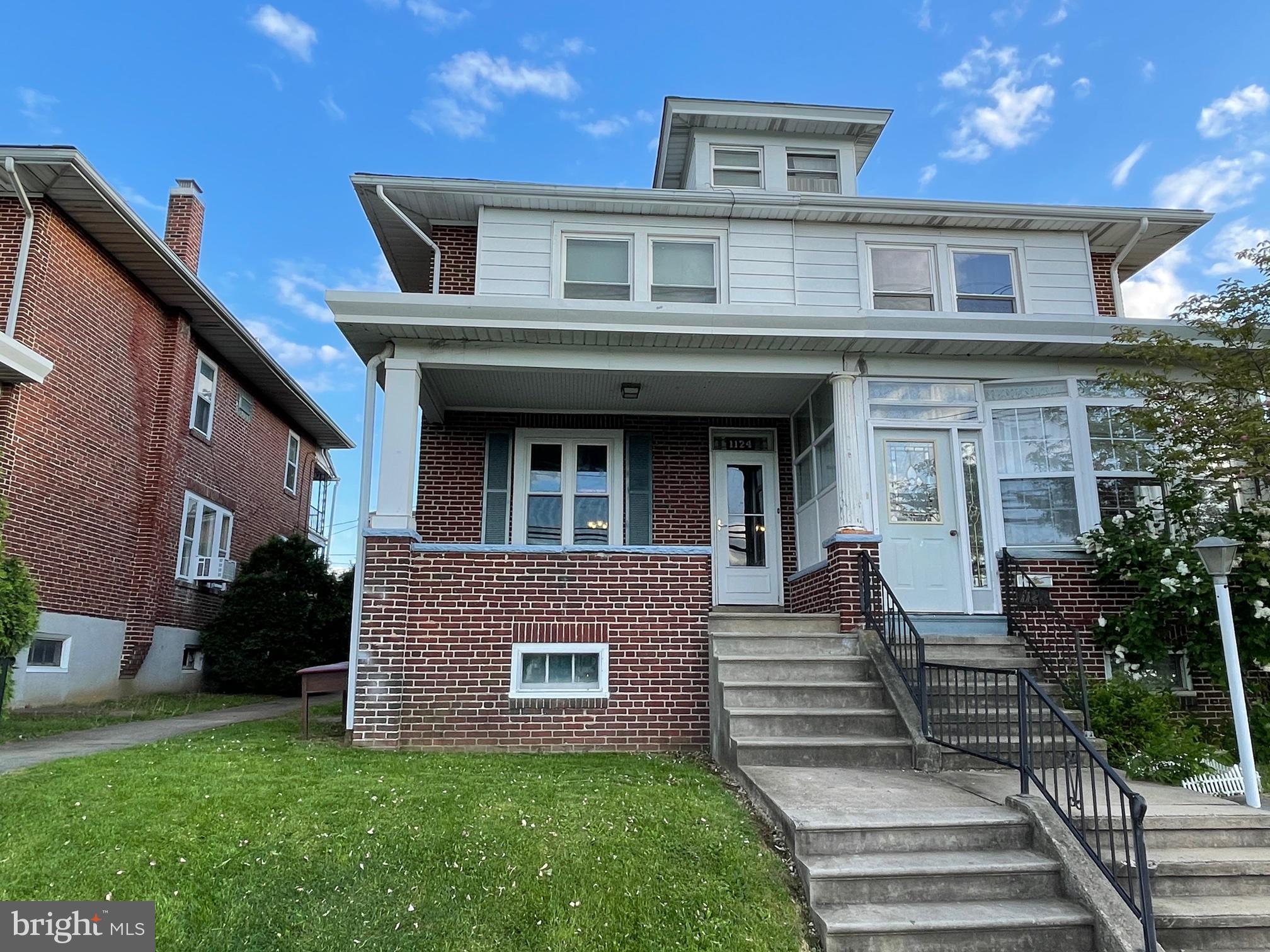 1124 Exeter Street Reading, PA 19604 - Photo 1 of 39 Twin with covered porch