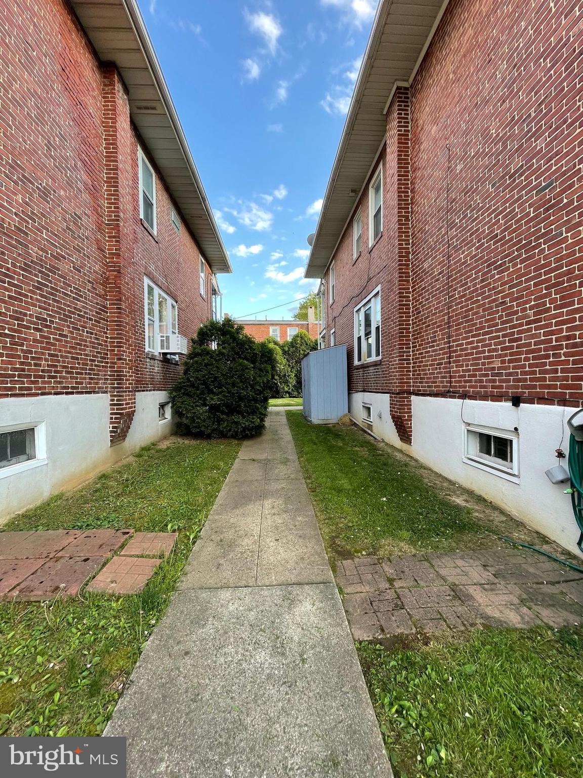 1124 Exeter Street Reading, PA 19604 - Photo 12 of 39 path between houses