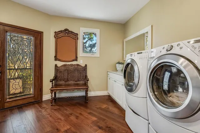 a utility room with dryer and washer