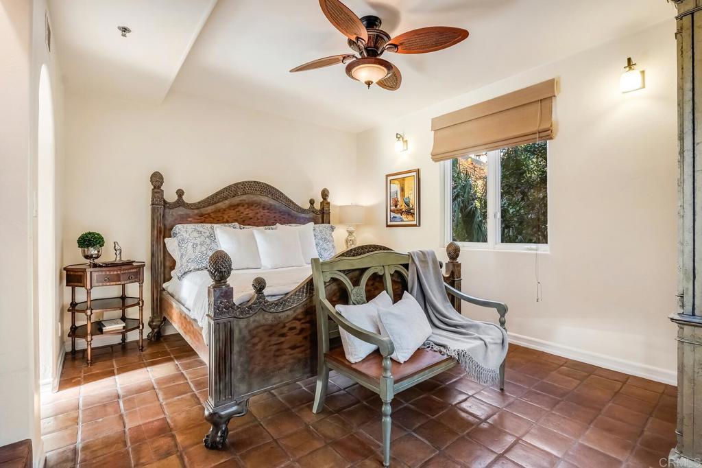 136 Hummingbird Hill Encinitas, CA 92024 - Photo 34 of 54 a view of a bedroom with furniture and a window