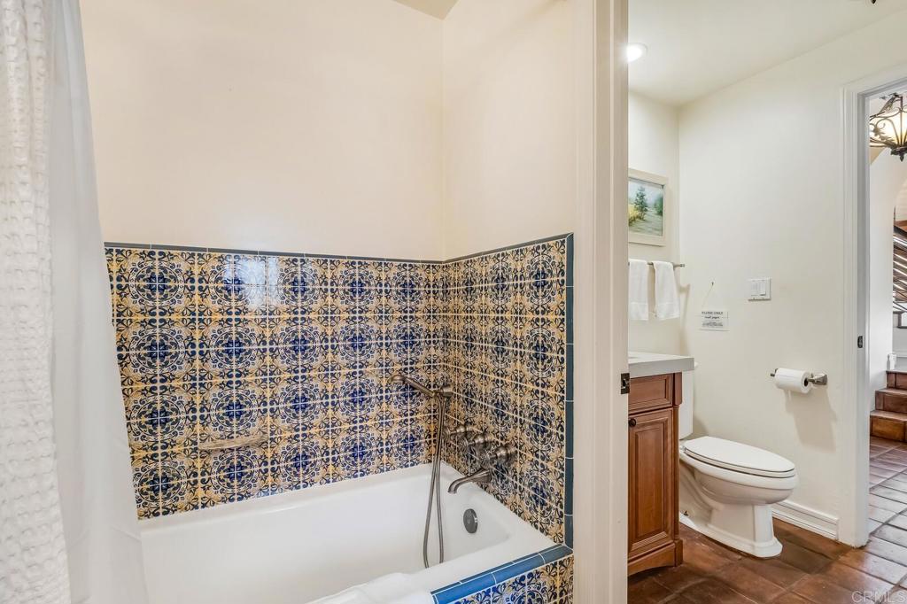 136 Hummingbird Hill Encinitas, CA 92024 - Photo 40 of 54 a bathroom with a toilet and a shower