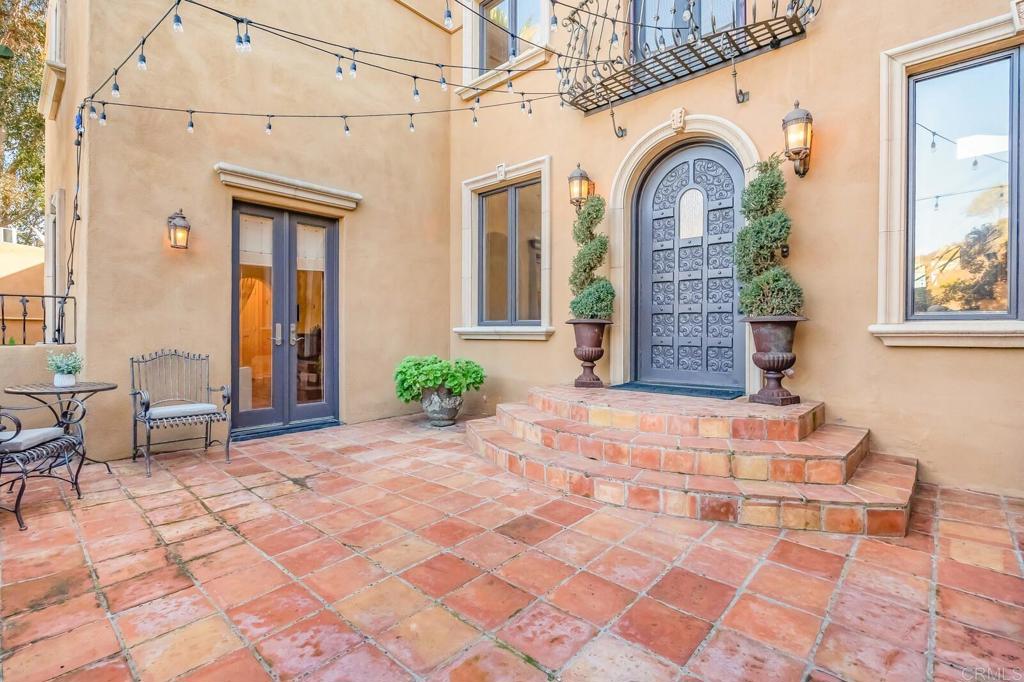 136 Hummingbird Hill Encinitas, CA 92024 - Photo 4 of 54 a front view of a house with garden