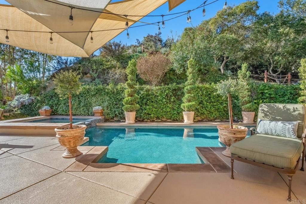 136 Hummingbird Hill Encinitas, CA 92024 - Photo 44 of 54 a view of a backyard with sitting area