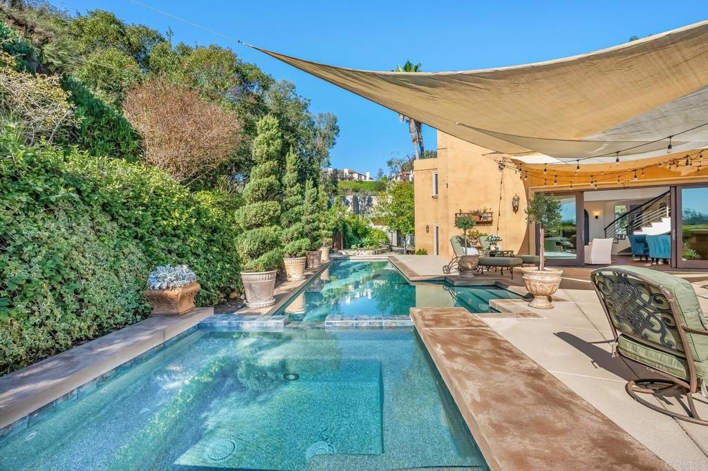 136 Hummingbird Hill Encinitas, CA 92024 - Photo 46 of 54 a view of swimming pool with outdoor seating and plants