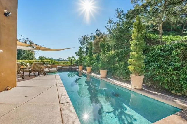 a view of yard with patio