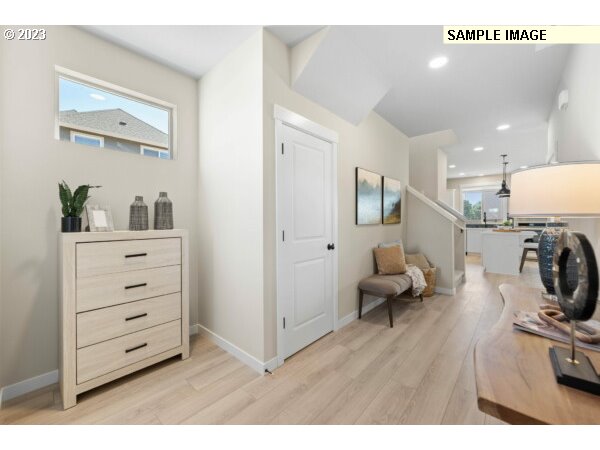 231 South 87th Avenue Ridgefield, WA 98642 - Photo 3 of 33 a living room with furniture and a wooden floor