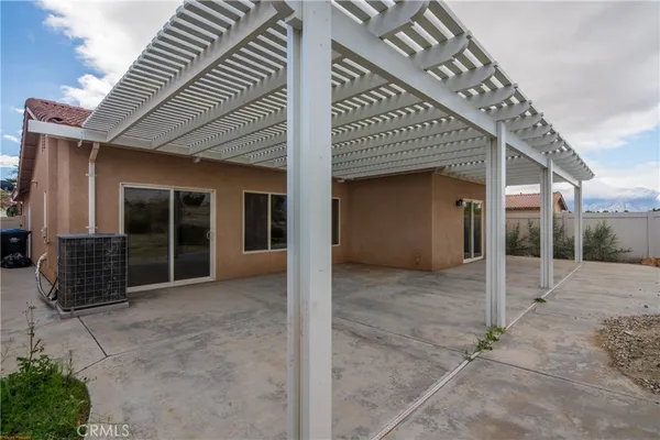 a view of a house with a patio