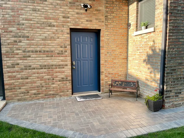 a view of front door of house with outdoor space