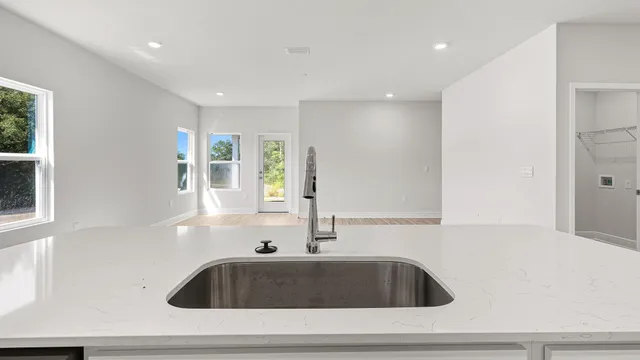 a bathroom with a sink and bathtub