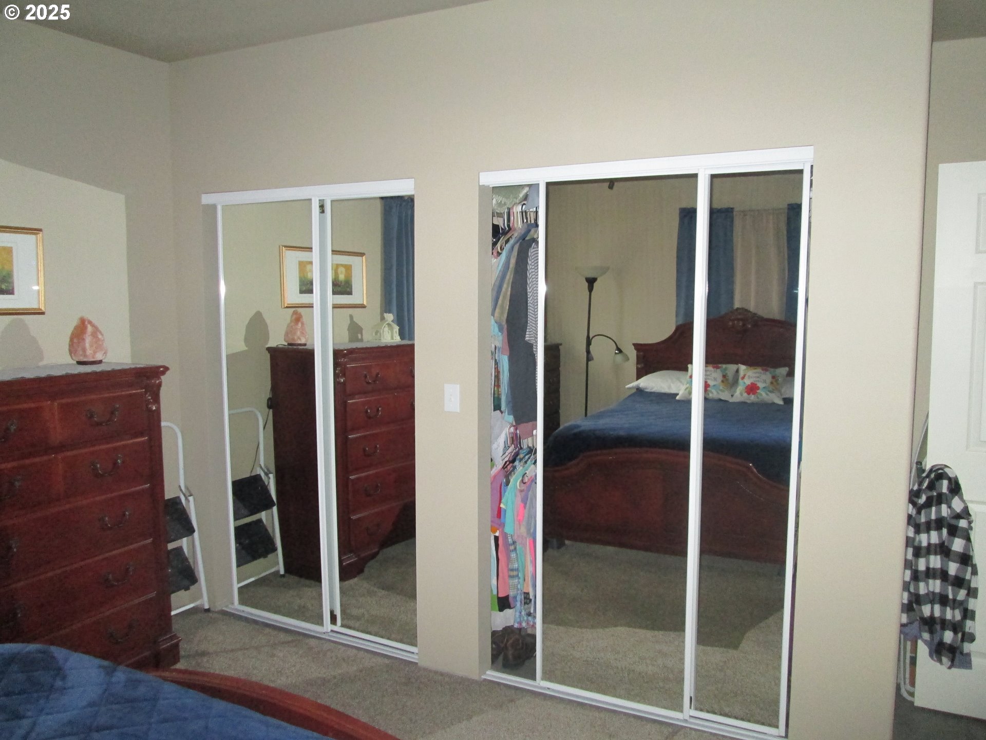 404 Pendleton Avenue Ukiah, OR 97880 - Photo 10 of 12 a bathroom with a glass door shower and a mirror