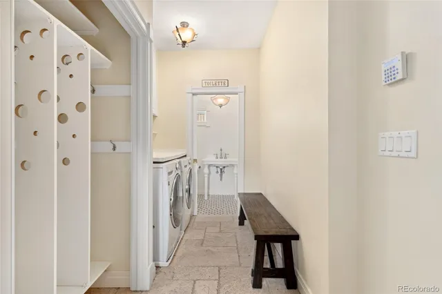 a view of a hallway with seating area