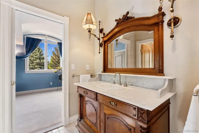 a living room with furniture windows and wooden floor