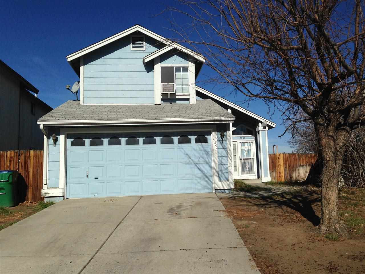 4005 Perro Lane Reno, NV 89502 - Photo 1 of 1 a front view of house with garage