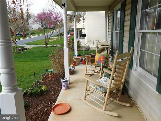 3810 Misty Hollow Point of Rocks, MD 21777 - Photo 2 of 29 a view of an chairs and tables in the patio
