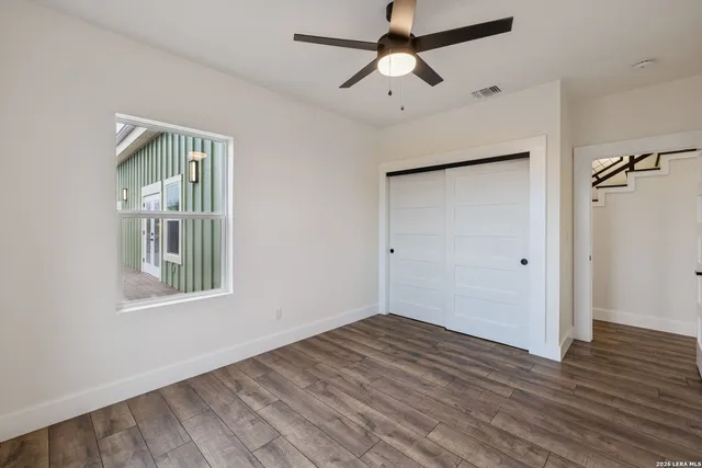 a view of an empty walk in closet