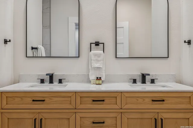 a view of a house with backyard sitting area and garden