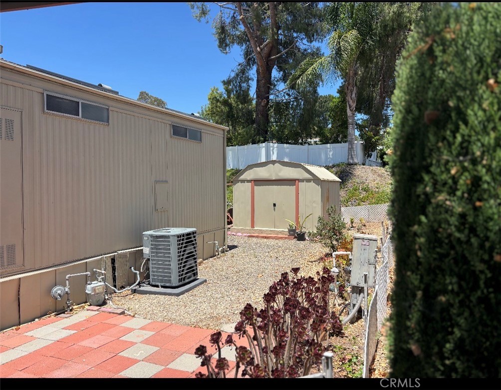 31130 South General Kearny Road, Unit 18 Temecula, CA 92591 - Photo 4 of 32 Side of home by garage port