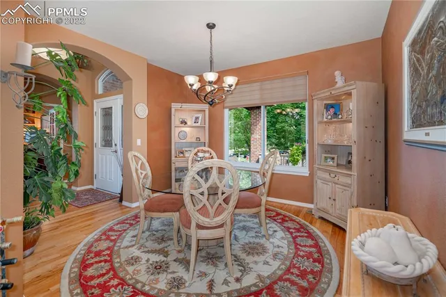 a kitchen with sink stove and cabinets