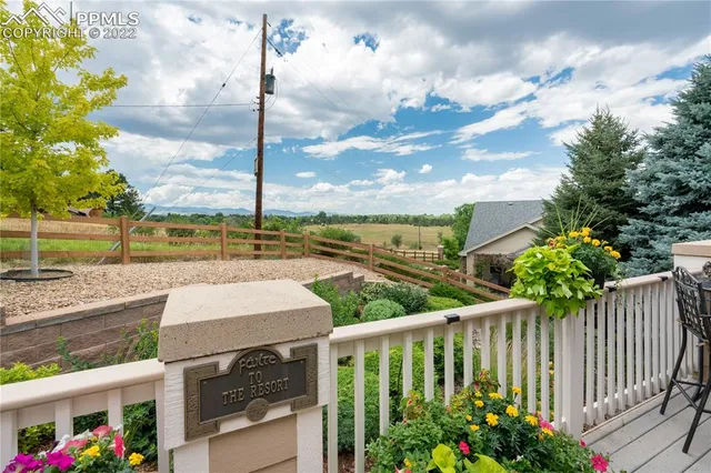 a dining space with furniture and outdoor space